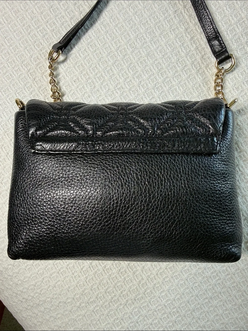 Kate Spade black quilted leather crossbody bag with gold chain and hardware